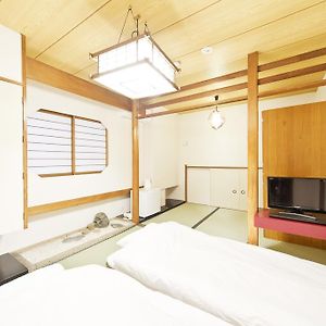 Kamer met Twee Aparte Bedden in Japanse Stijl